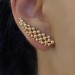 Ear cuff bolinhas com banho de ouro 18k